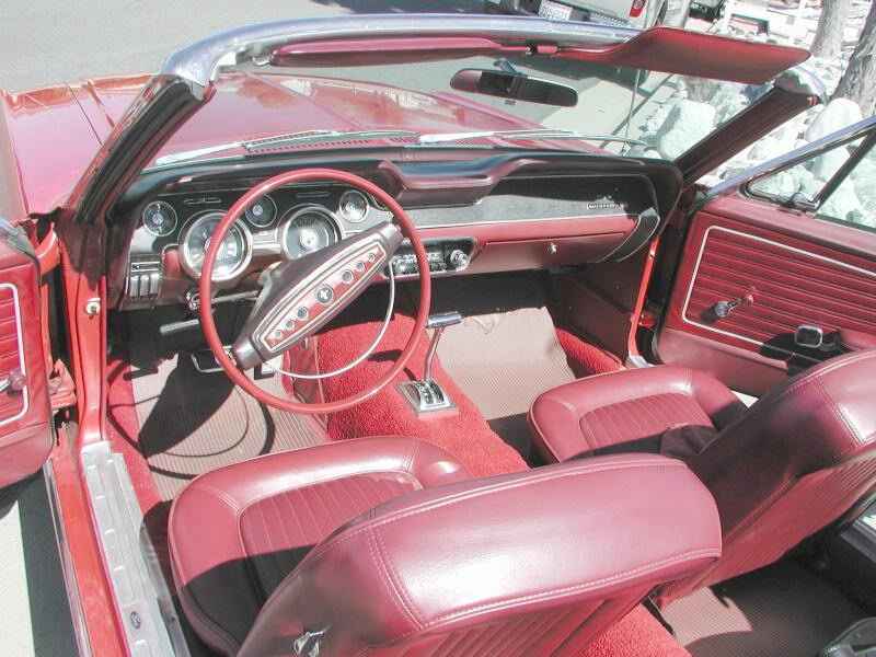 The'68 Mustang interior had the two spoke steering wheel and five round 